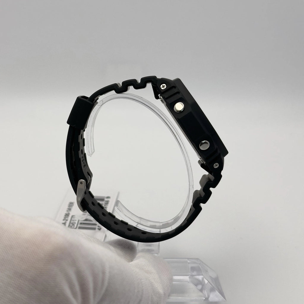 Black watch case on a gray background